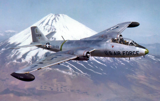 A US Air Force Martin B-57C Canberra of the 3rd Bombardment Group flies over Mt. Fuji in 1957. Note the tandem cockpit added to increase visibility for pilot and navigator. (US Air Force)